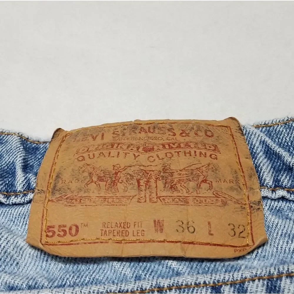 VINTAGE 1996 Levi's 550 Relaxed Fit Tapered Leg Distressed Stone Wash Mom Jeans